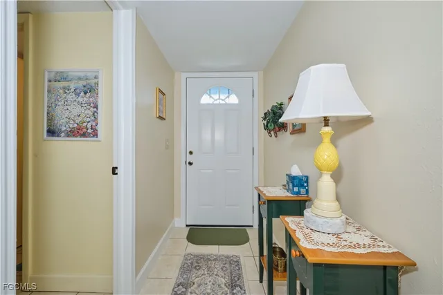 a bathroom with a sink mirror and vanity