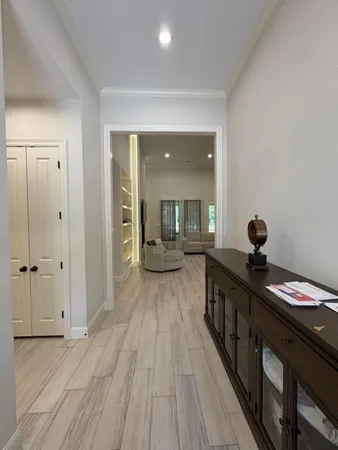 a view of a bedroom from a hallway