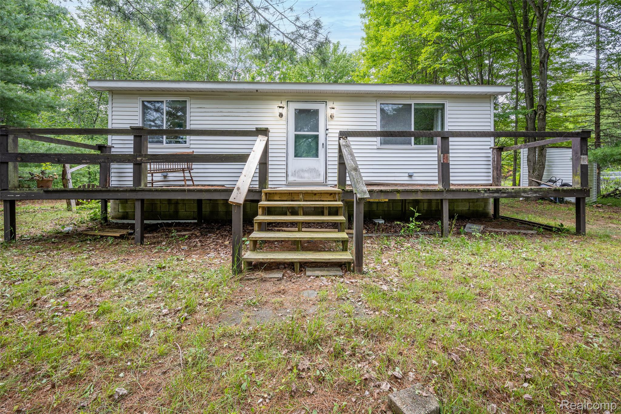 945 North Hockaday Road Gladwin, MI 48624 - Photo 16 of 25 Expansive Deck