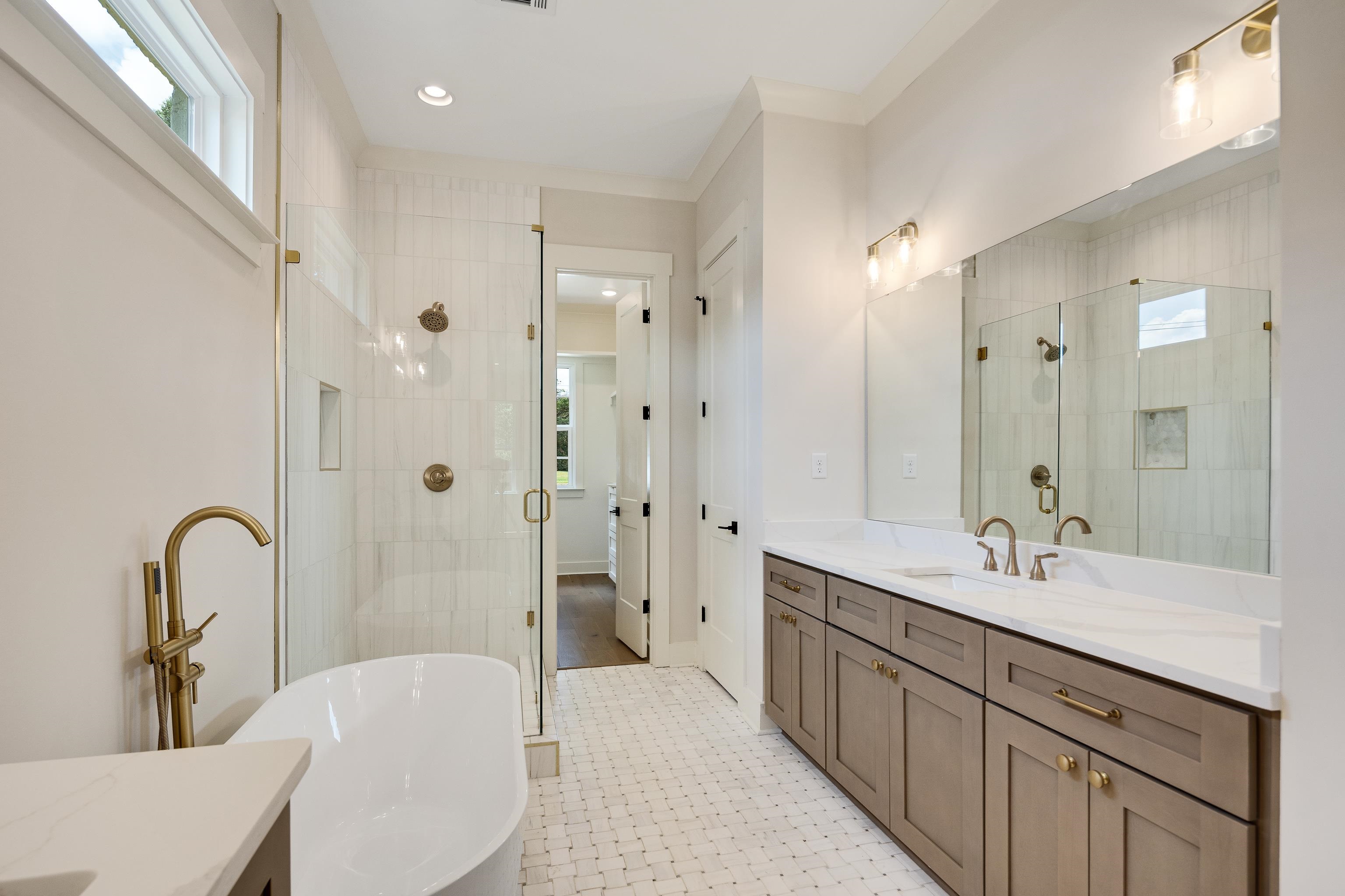 352 Avon Road Memphis, TN 38117 - Photo 14 of 26 Bathroom with healthy amount of natural light, vanity, a shower stall, a freestanding bath, and recessed lighting