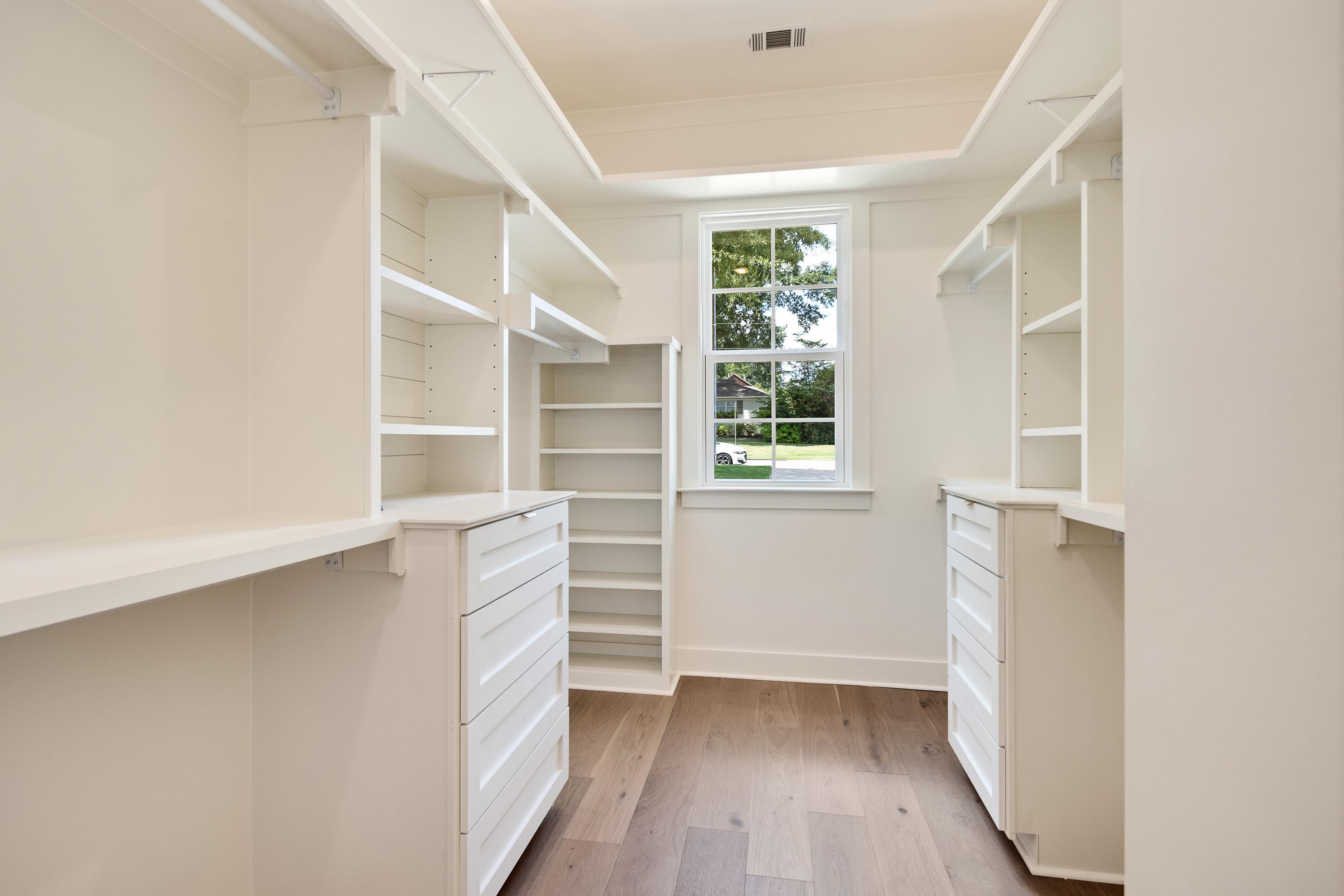 352 Avon Road Memphis, TN 38117 - Photo 16 of 26 Spacious closet featuring light wood-style flooring