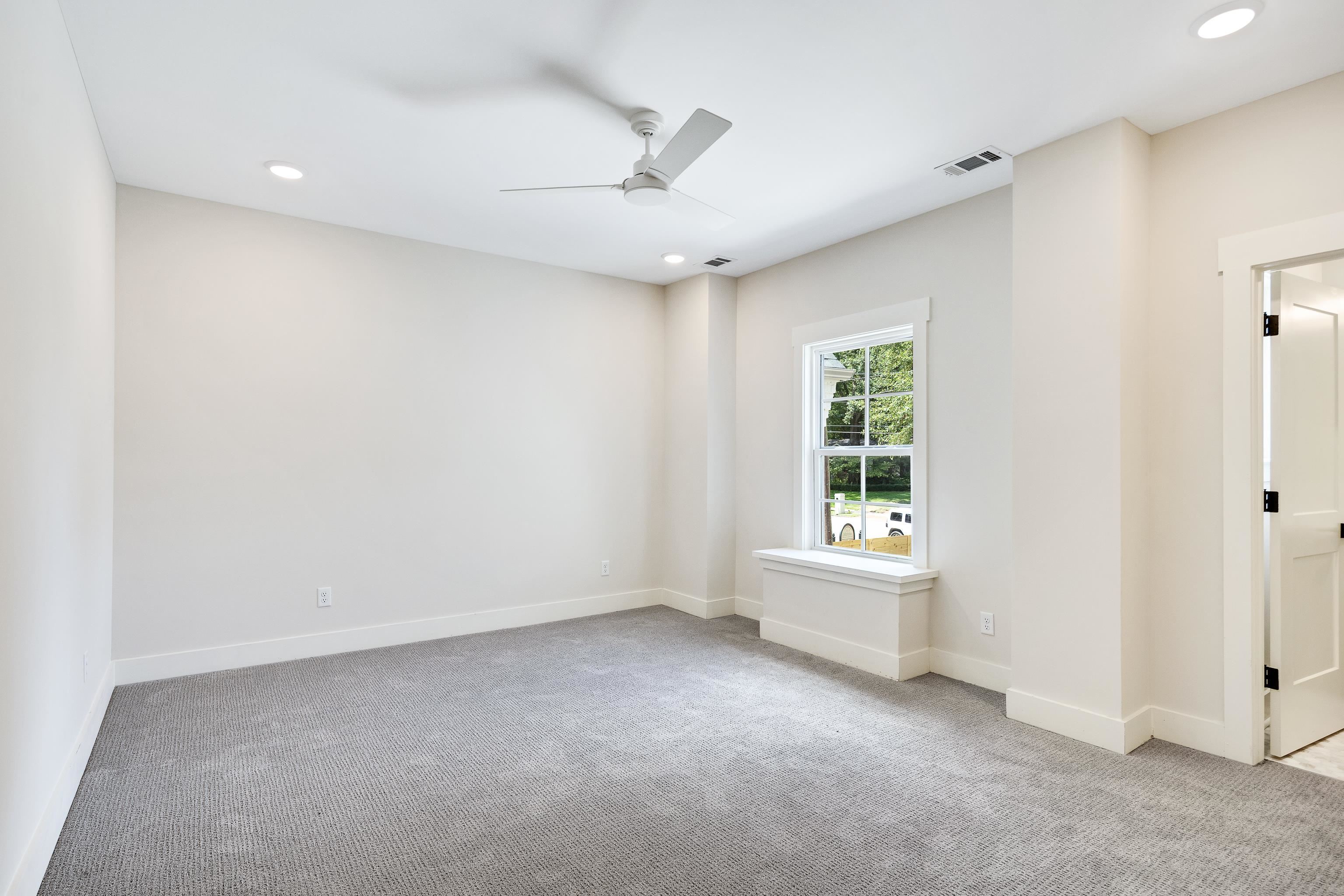 352 Avon Road Memphis, TN 38117 - Photo 18 of 26 Unfurnished room with recessed lighting, light colored carpet, and a ceiling fan