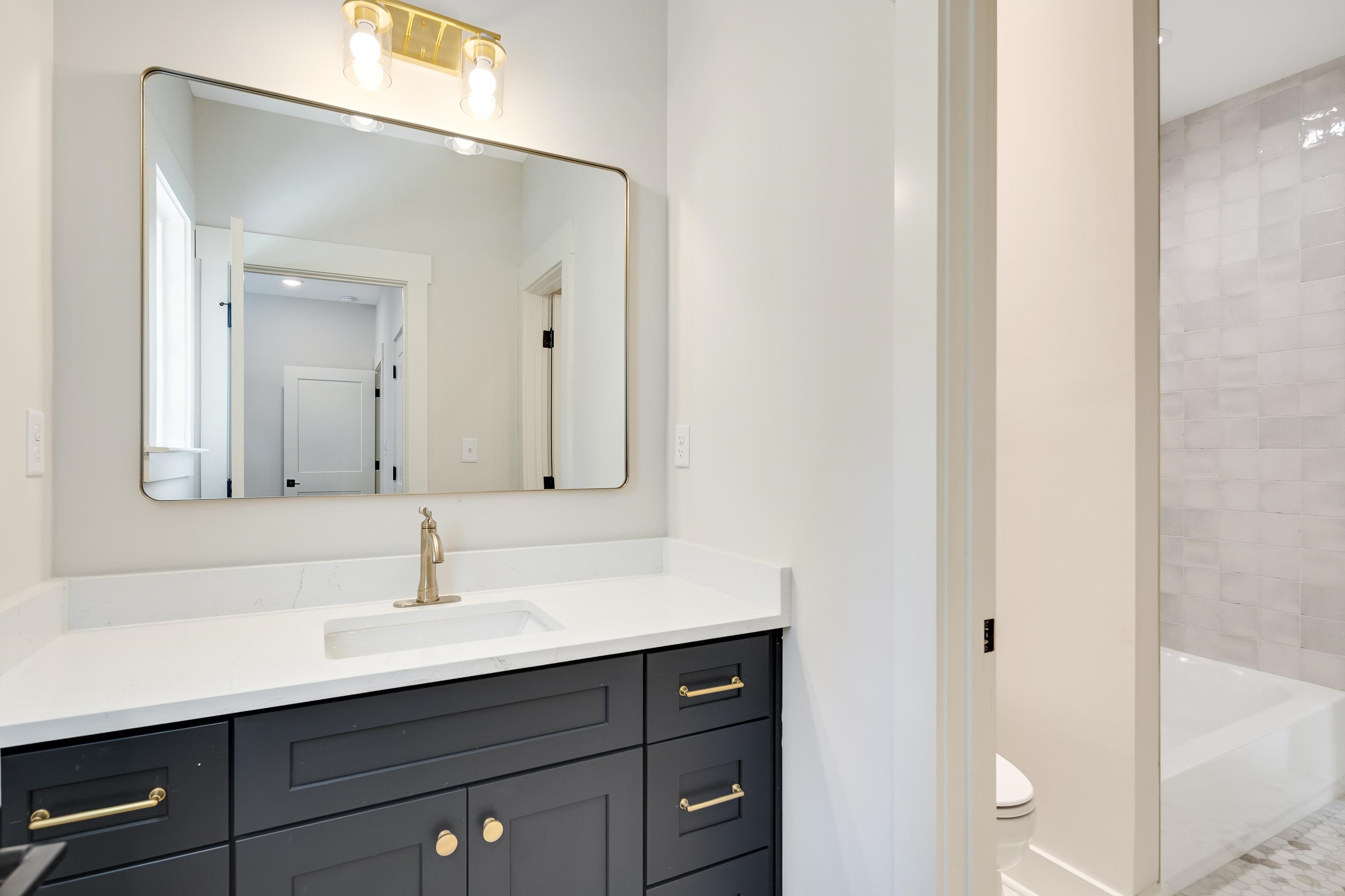 352 Avon Road Memphis, TN 38117 - Photo 19 of 26 Bathroom featuring vanity and shower / bath combination