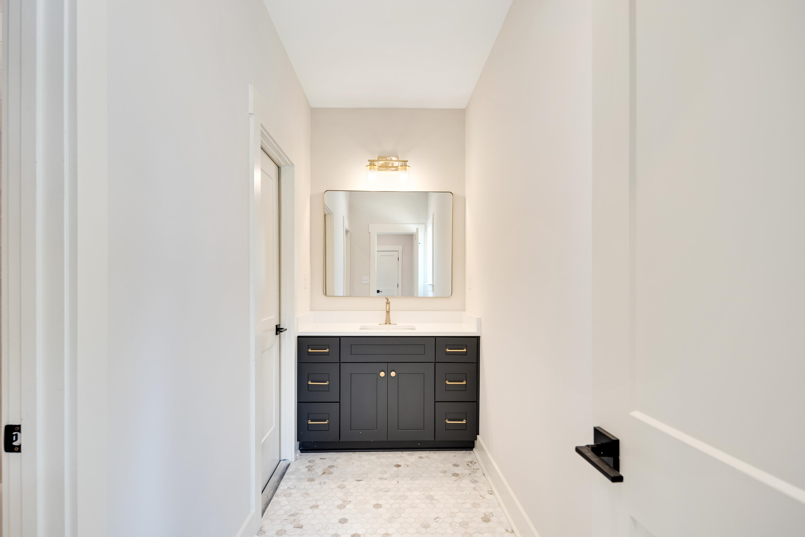 352 Avon Road Memphis, TN 38117 - Photo 21 of 26 Bathroom featuring vanity and baseboards