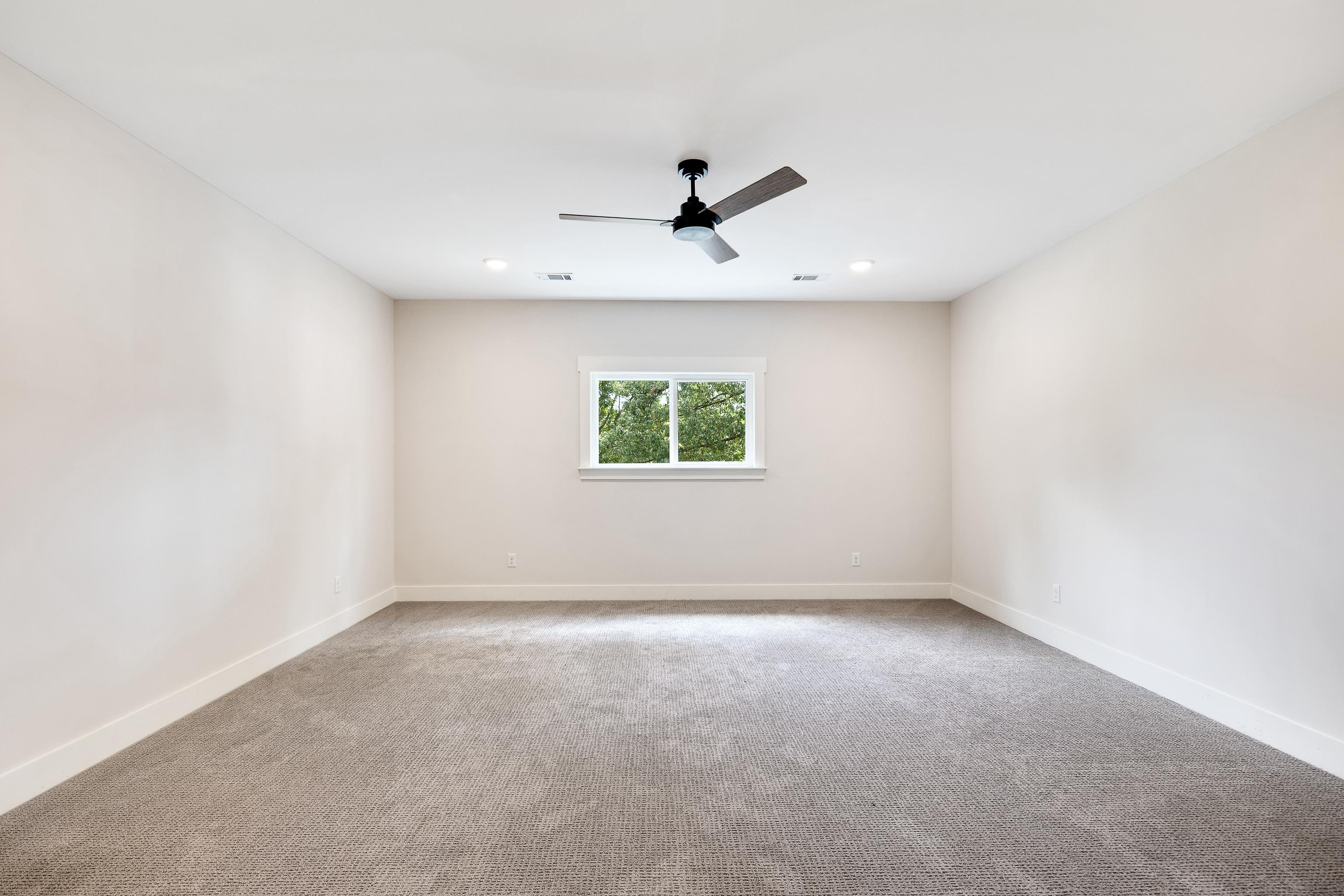 352 Avon Road Memphis, TN 38117 - Photo 22 of 26 Spare room featuring light colored carpet, recessed lighting, and a ceiling fan