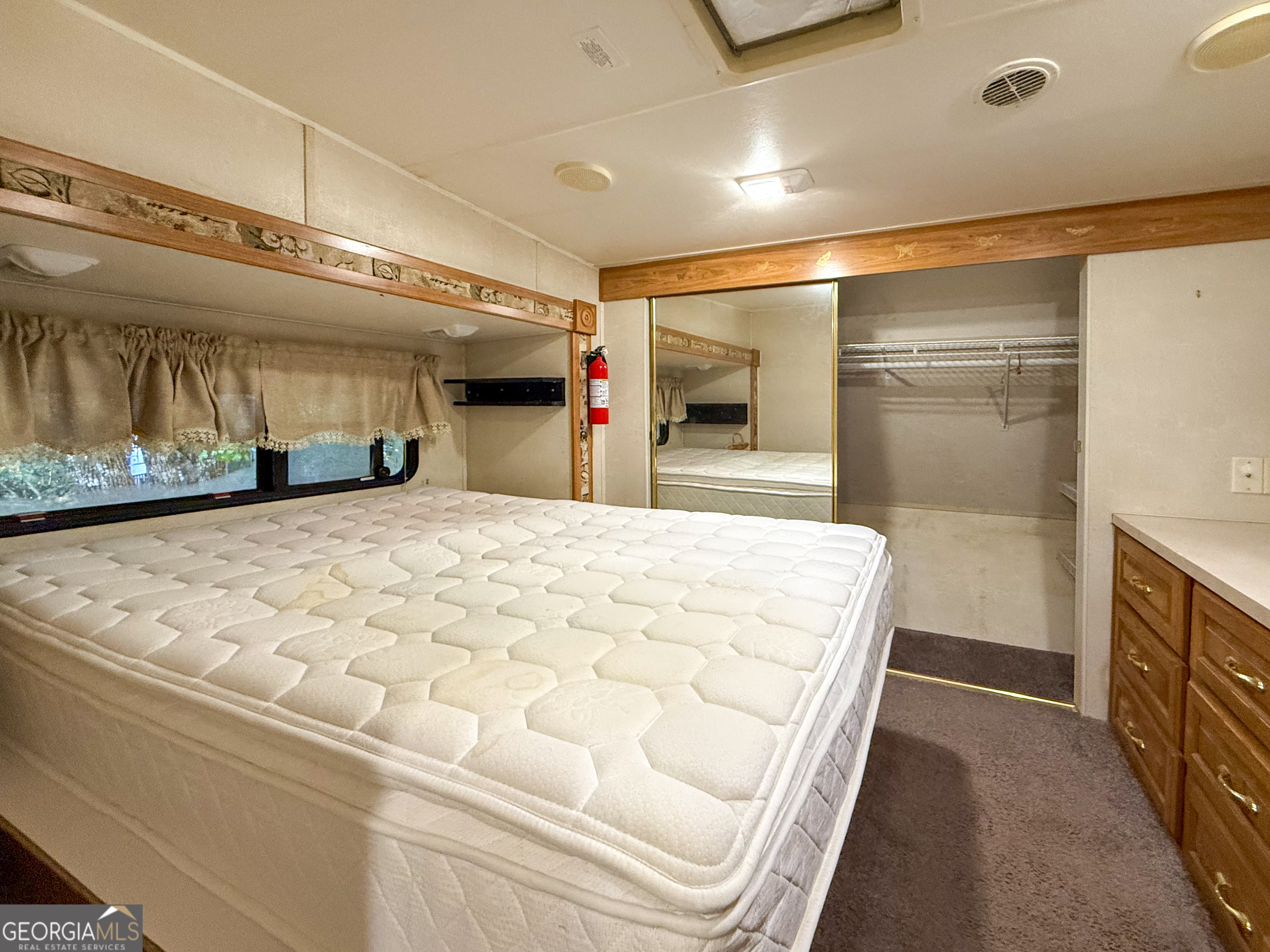 159 Canyon Pass Cleveland, GA 30528 - Photo 12 of 19 a large white bed in a kitchen
