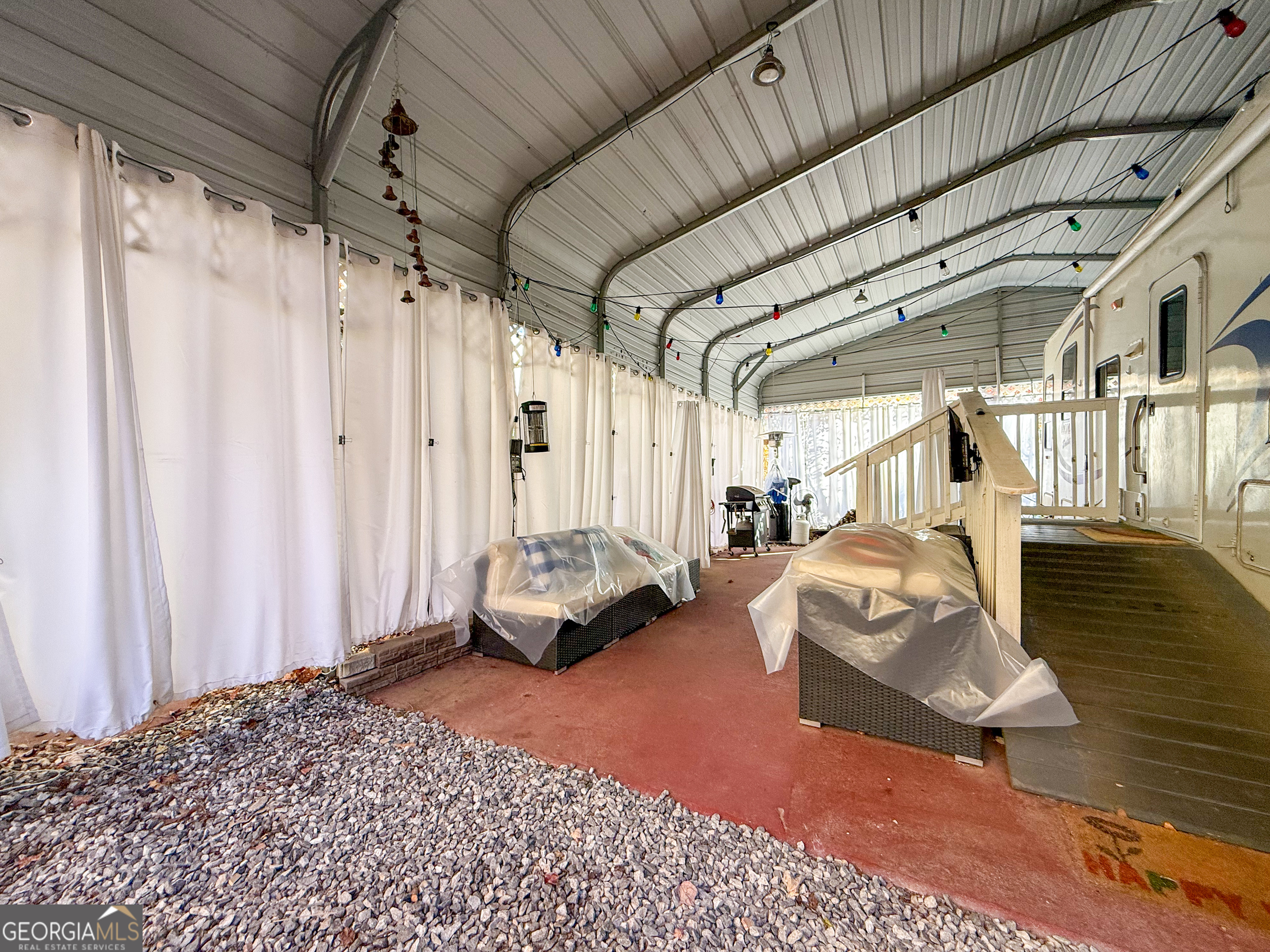 159 Canyon Pass Cleveland, GA 30528 - Photo 17 of 19 a living room with furniture and a window