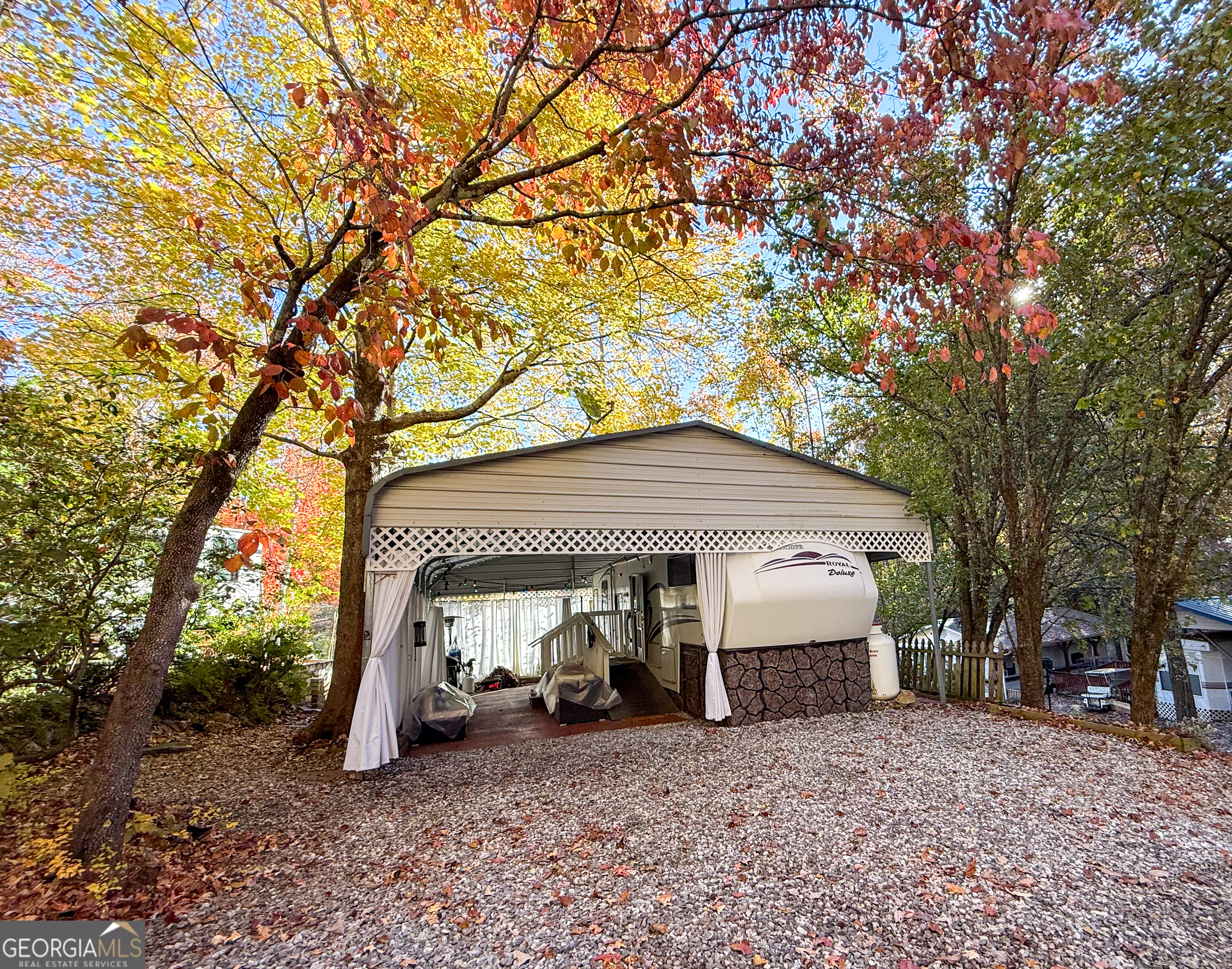 159 Canyon Pass Cleveland, GA 30528 - Photo 19 of 19 a view of a house with a patio