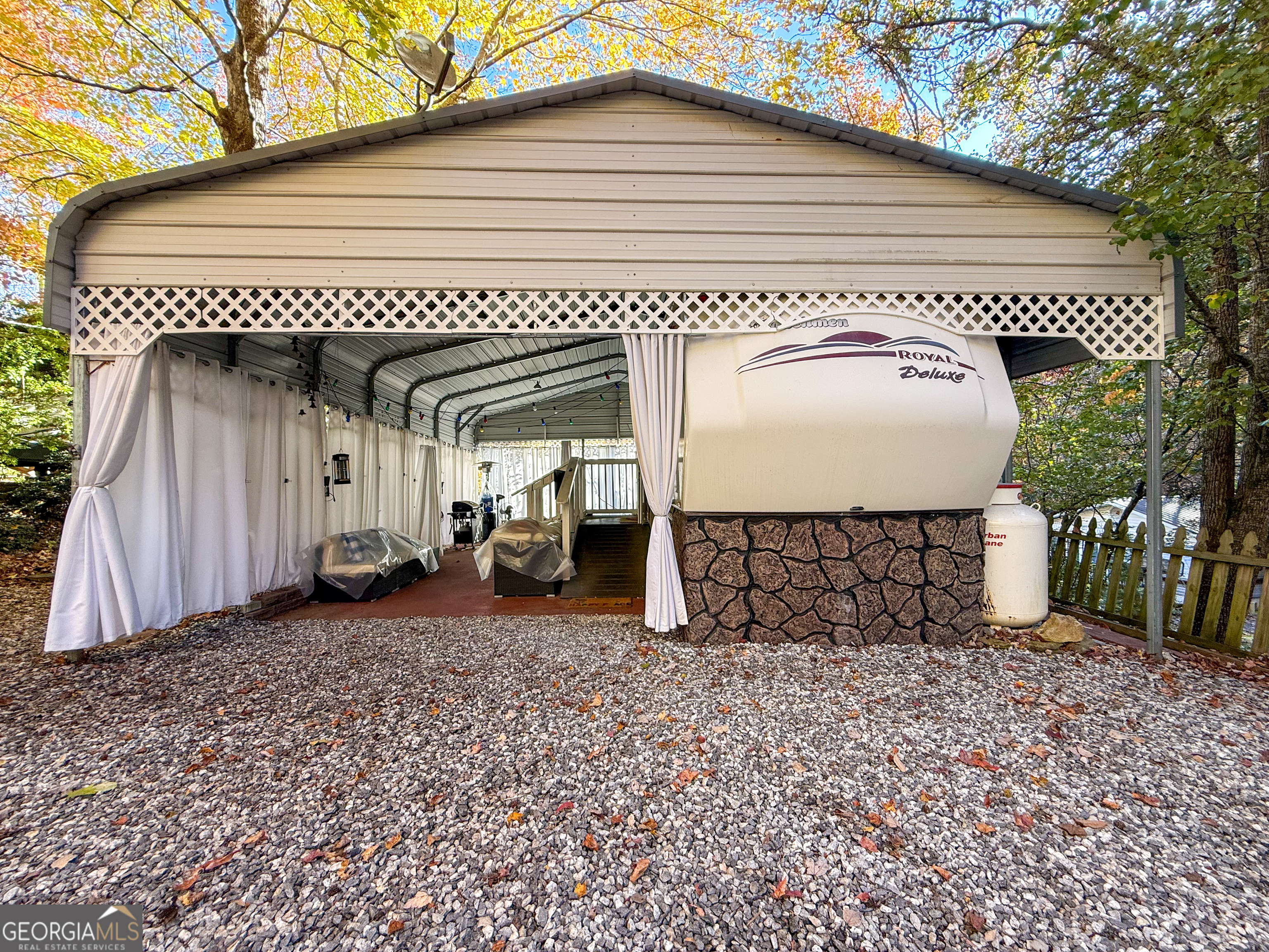 159 Canyon Pass Cleveland, GA 30528 - Photo 2 of 19 a front view of a house with garden