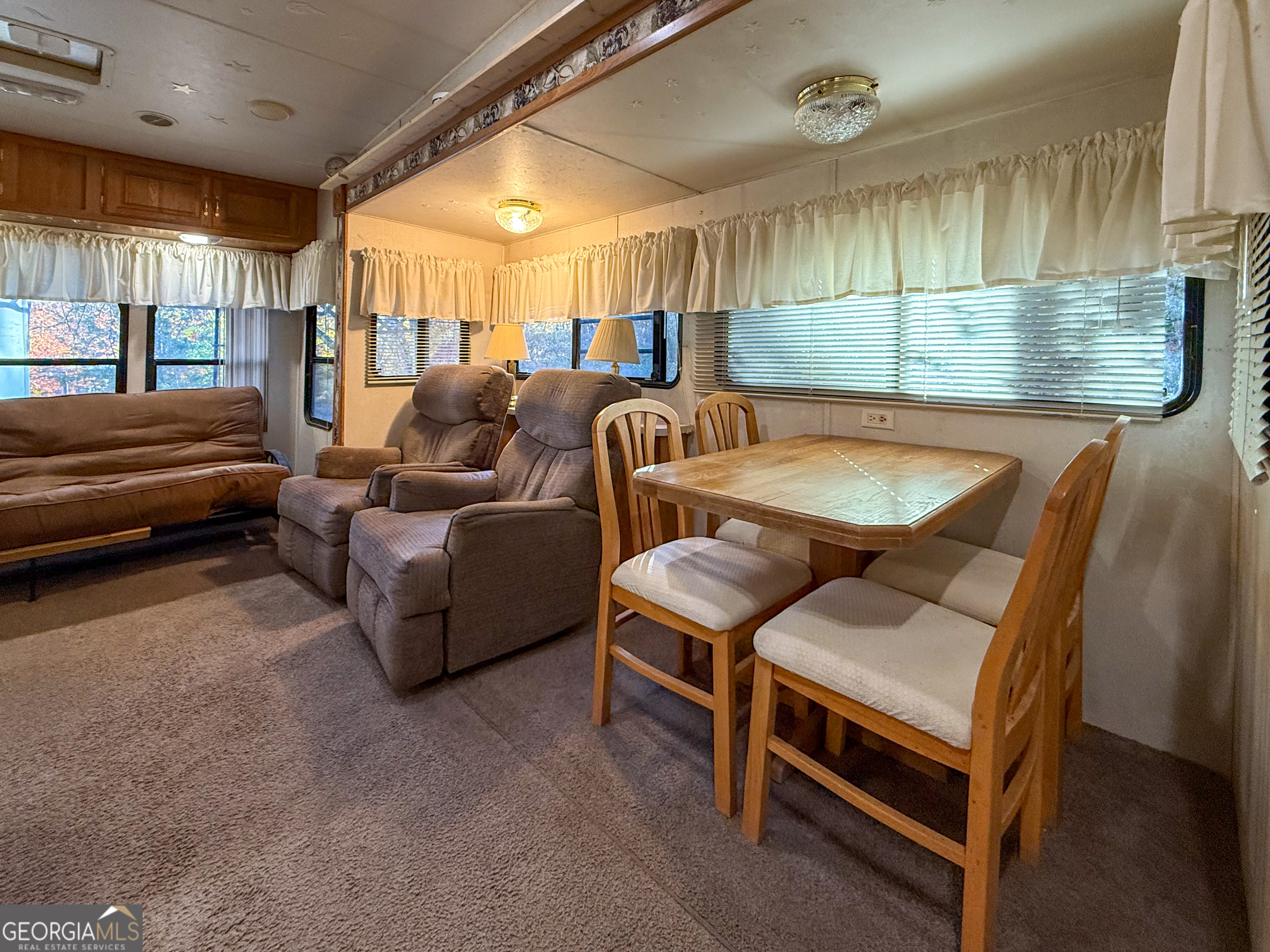 159 Canyon Pass Cleveland, GA 30528 - Photo 7 of 19 a living room with furniture and a window