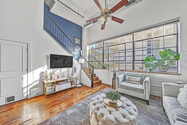a bathroom with a sink mirror and vanity