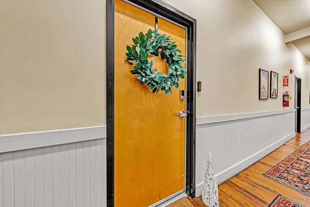 a kitchen with stainless steel appliances granite countertop a stove a refrigerator and a cabinets