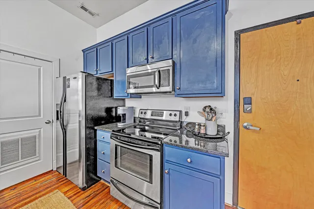 a room with furniture and a large window