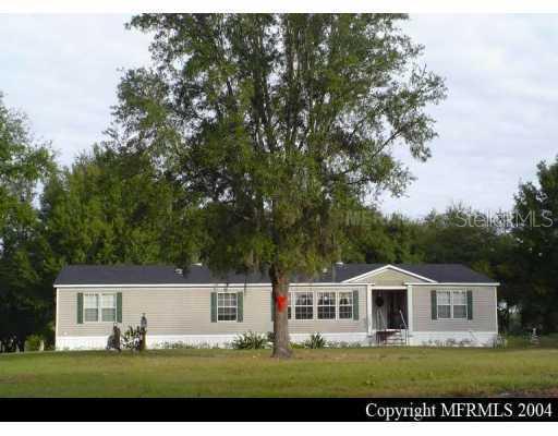 22665 Loop Road Groveland, FL 34736 - Photo 1 of 1 Exterior Front