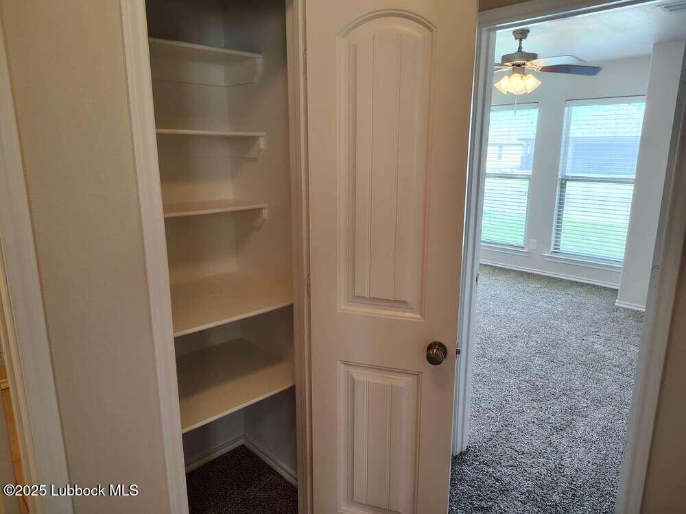 7046 95th Street Lubbock, TX 79424 - Photo 20 of 23 a view of closet