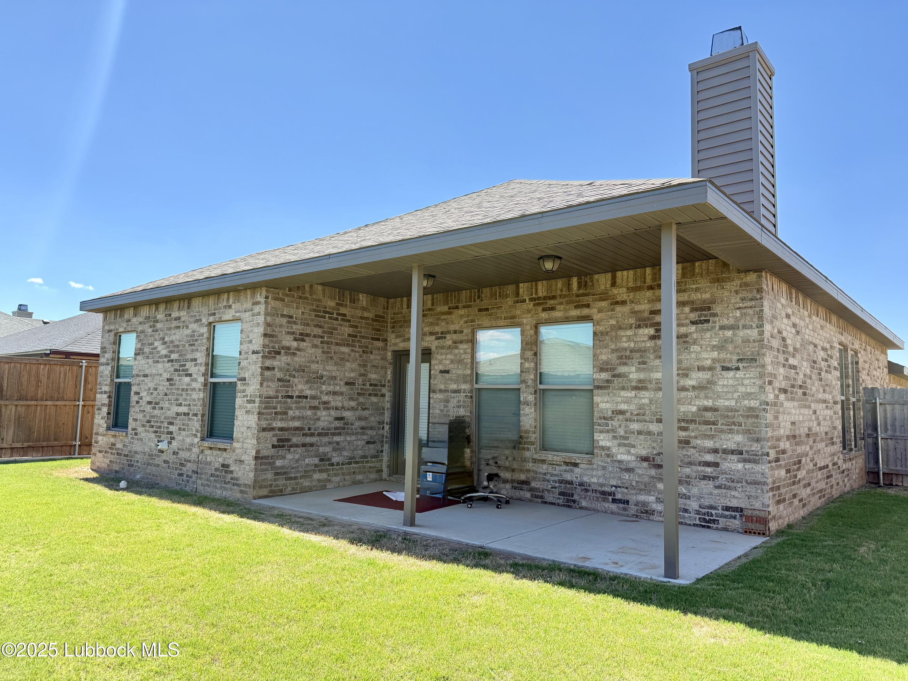 7046 95th Street Lubbock, TX 79424 - Photo 23 of 23 a front view of a house with swimming pool