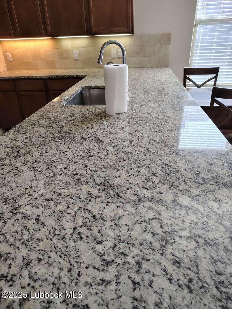 7046 95th Street Lubbock, TX 79424 - Photo 6 of 23 a close view of sink