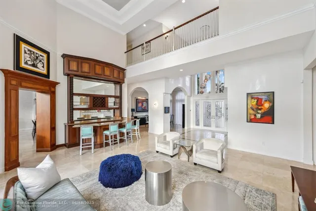a kitchen with stainless steel appliances kitchen island granite countertop a stove and cabinets