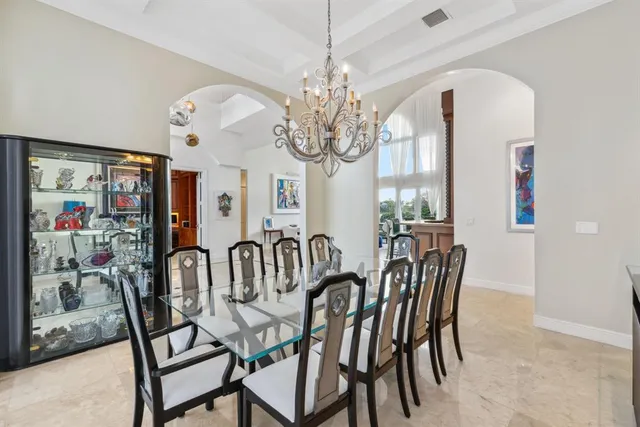 a bathroom with a bathtub shower sink and mirror