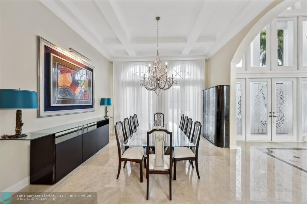 2753 West Stonebrook Circle Davie, FL 33330 - Photo 17 of 88 a view of a dining room with furniture a chandelier and wooden floor