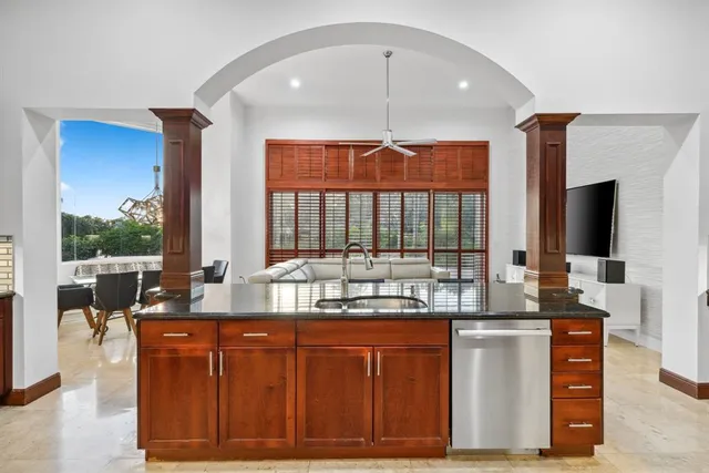 a view of a house with a plants and entryway