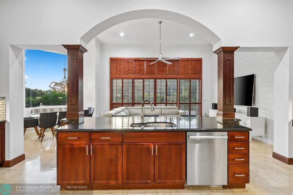 2753 West Stonebrook Circle Davie, FL 33330 - Photo 19 of 88 a dining hall with stainless steel appliances granite countertop a stove and a sink