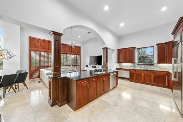 a view of bathroom with a tub shower and a sink