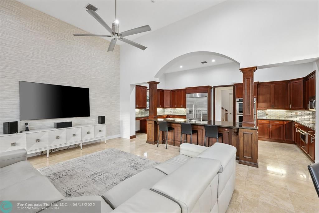 2753 West Stonebrook Circle Davie, FL 33330 - Photo 25 of 88 a living room with furniture and a flat screen tv