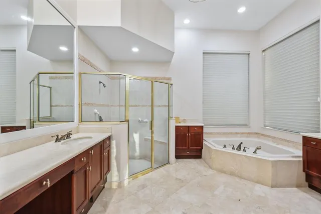 a sidewalk with a palm trees