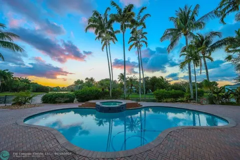 an aerial view of a house with outdoor space