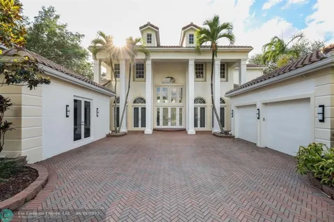 a view of a house with a swimming pool