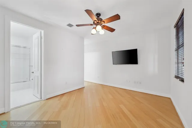 a view of a swimming pool with a lounge chairs