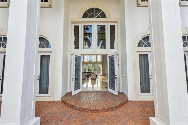 a kitchen with stainless steel appliances granite countertop a stove microwave and sink