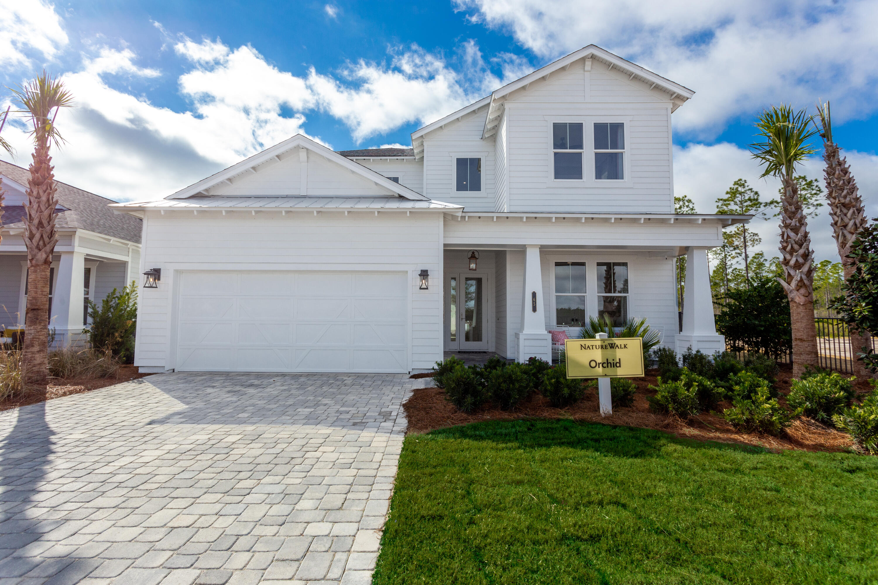149 Pennekamp Ln Inlet Beach Inlet Beach, FL 32461 - Photo 1 of 1 a front view of a house with garden