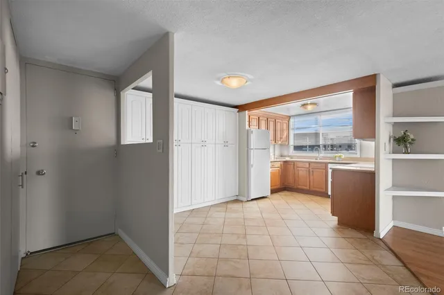 a view of a kitchen with a sink and dishwasher