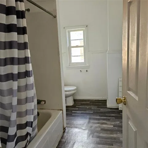 an empty room with a empty space and empty racks