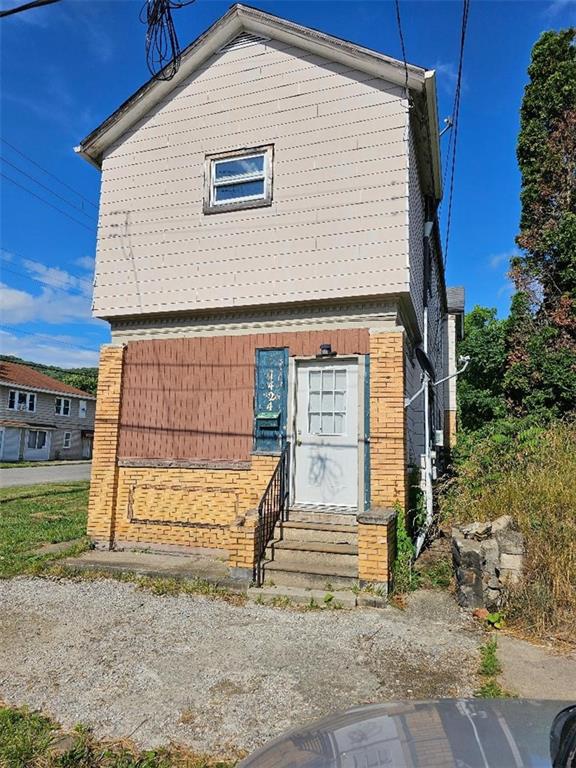 1424 4th Avenue Beaver Falls, PA 15010 - Photo 2 of 14 a view of a house with a yard