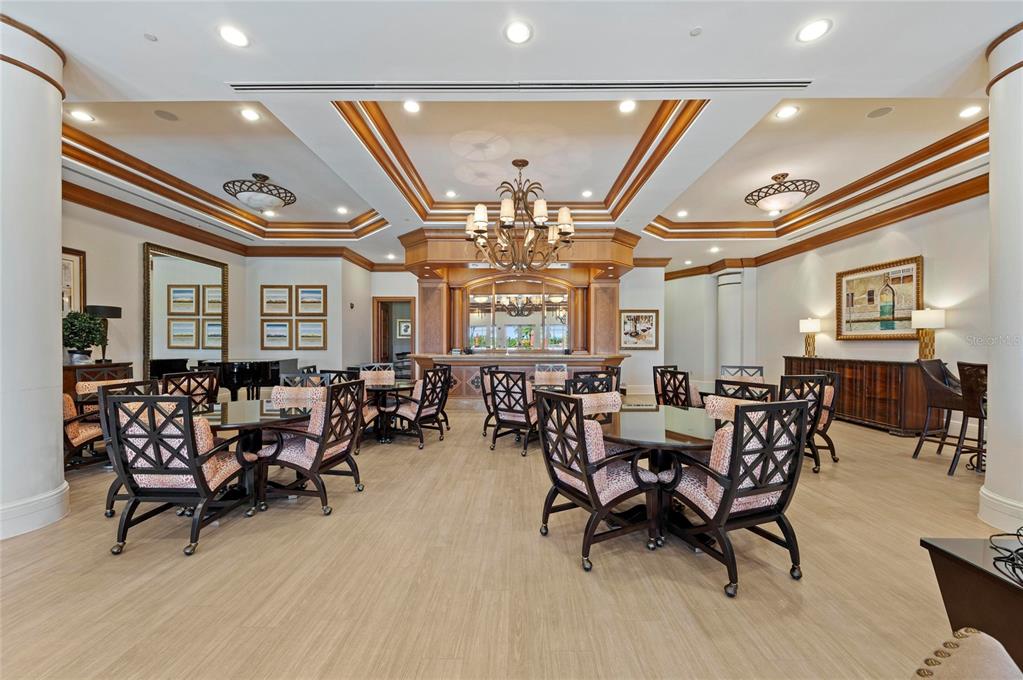 3329 Sunset Key Circle, Unit 407 Punta Gorda, FL 33955 - Photo 57 of 68 a view of a livingroom with furniture and chandelier