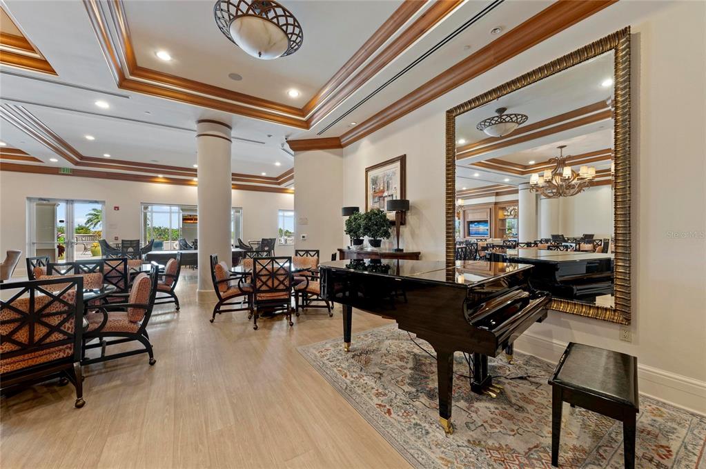 3329 Sunset Key Circle, Unit 407 Punta Gorda, FL 33955 - Photo 58 of 68 a living room with lots of furniture and a large window