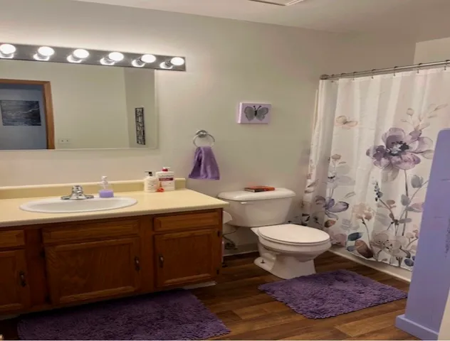 a kitchen with a refrigerator and a stove