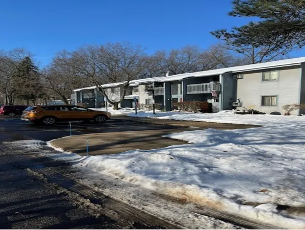 a view of street with parked cars