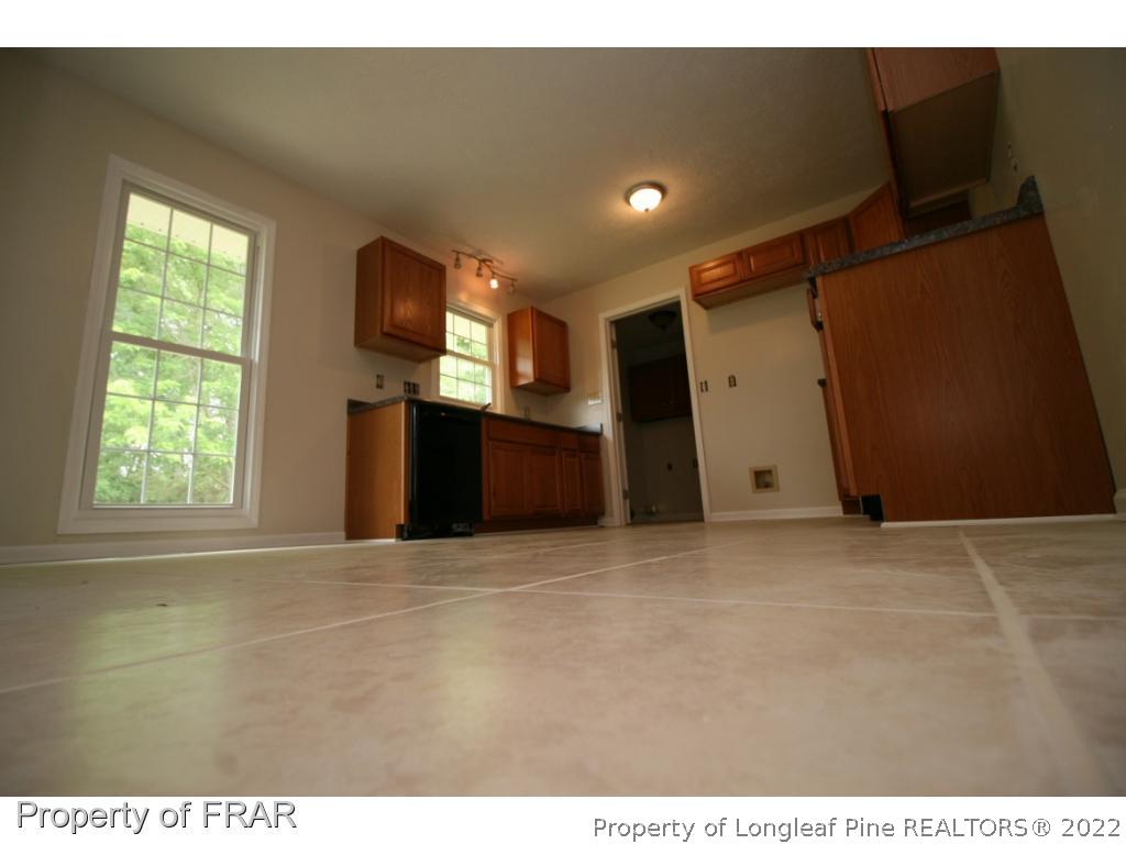 2255 Hackney Loop Fayetteville, NC 28304 - Photo 17 of 36 a view of an empty room with a window