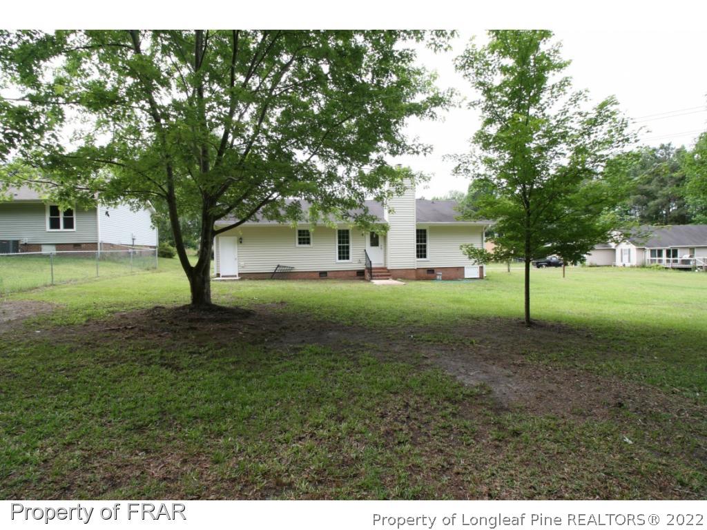 2255 Hackney Loop Fayetteville, NC 28304 - Photo 27 of 36 a view of a yard with large tree