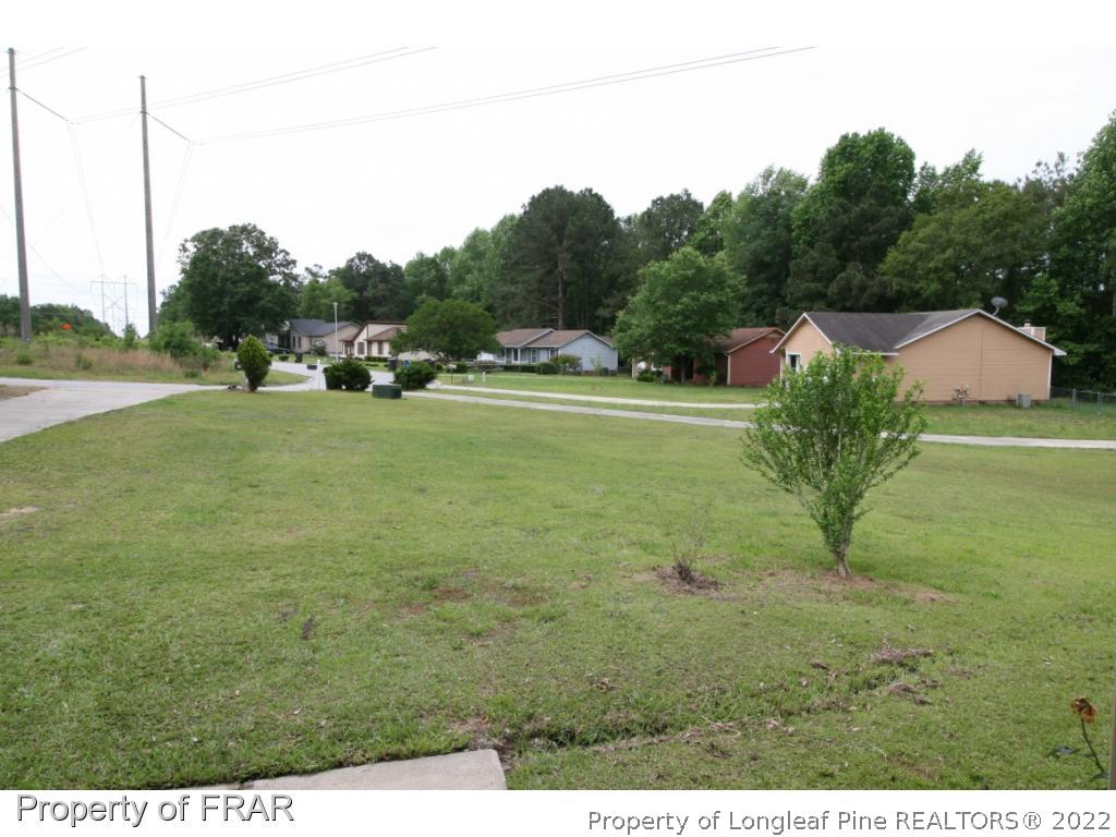 2255 Hackney Loop Fayetteville, NC 28304 - Photo 5 of 36 a view of a garden