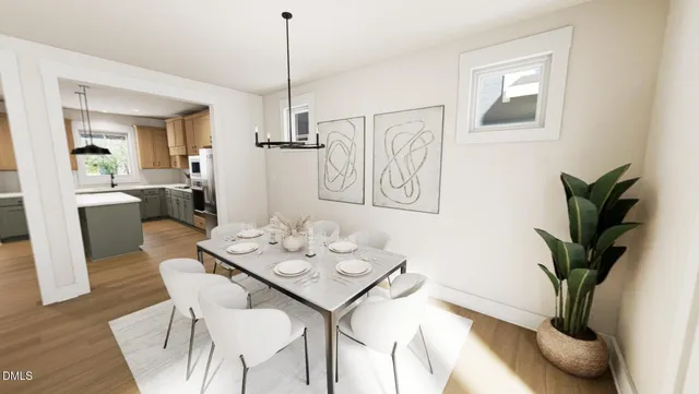 a view of a dining room with furniture and wooden floor