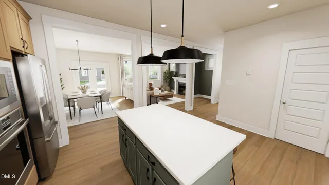 a group of people sitting in front of retail shop