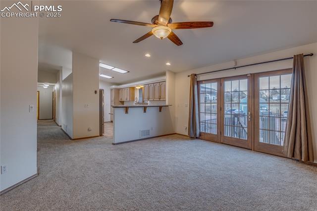 7501 Tudor Road Colorado Springs, CO 80919 - Photo 10 of 48 Family room with walk out to back patio