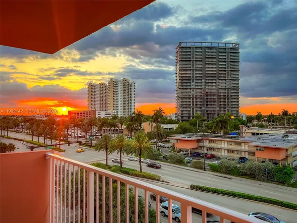 a view of city with tall buildings