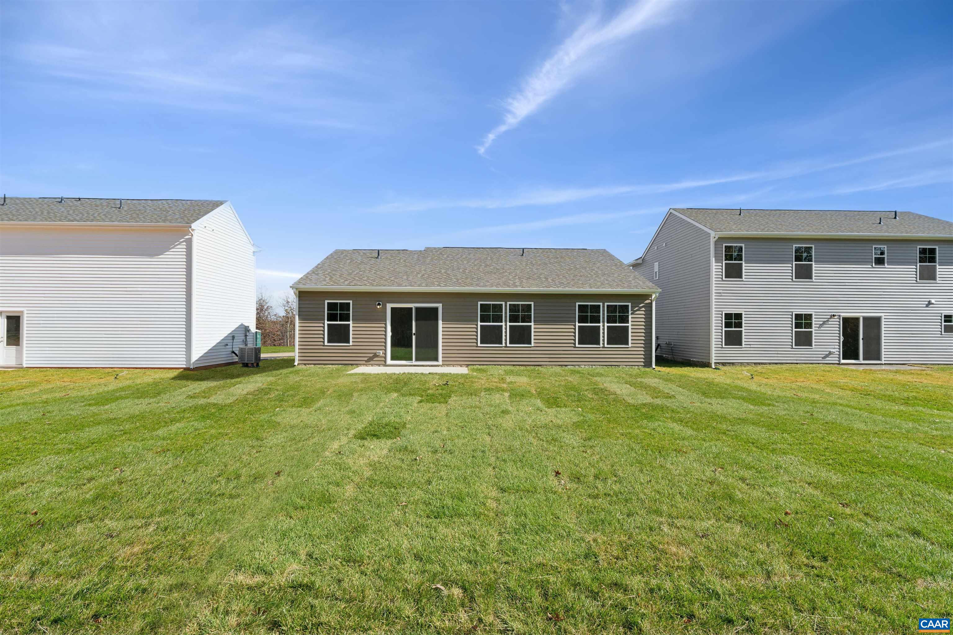 53 Horse Path Drive Palmyra, VA 22963 - Photo 17 of 26 a front view of a house with a garden
