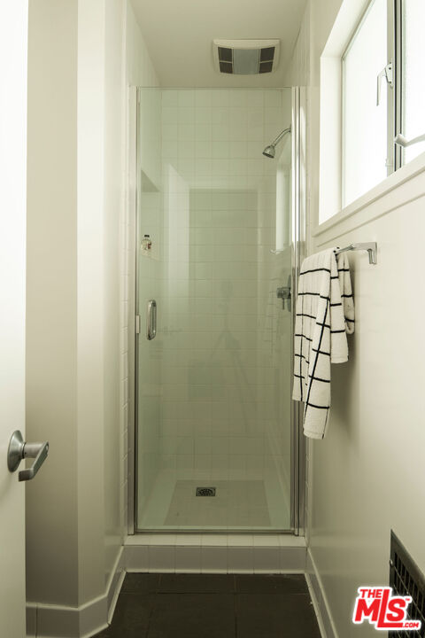 6006 Babbitt Avenue Encino, CA 91316 - Photo 18 of 32 a bathroom with a shower